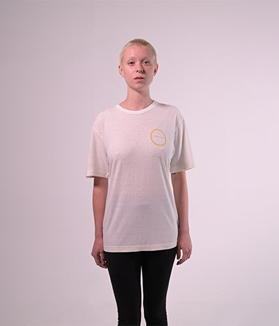 young lady wearing white shirt with logo